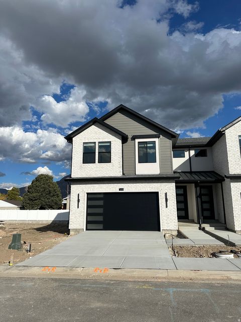 Photo of 6711 S VAUGHN LN E #7, Midvale, UT 84047 (MLS # 2145065)