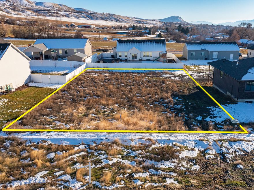 READY TO BUILD LOT FULLY STUBBED!   Close to Schools, Lees Marketplace grocery and  Cherry Peak Ski Resort is just a short drive!   Beautiul Location last lot in the subdivision!!