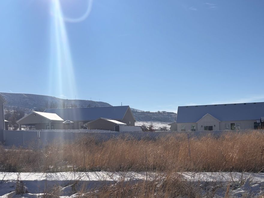 READY TO BUILD LOT FULLY STUBBED!   Close to Schools, Lees Marketplace grocery and  Cherry Peak Ski Resort is just a short drive!   Beautiul Location last lot in the subdivision!!