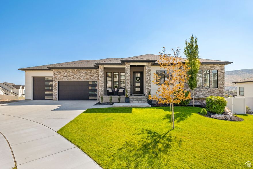 Seller offering 1/0 rate buydown with preferred lender - 5.321% first-year rate available. Contact agent for details. Striking modern rambler in Herriman's prestigious Brook Heights community! -where views stretch endlessly across the Salt Lake Valley and Wasatch Front. Designed for elevated single-level living with daylight basement, this home showcases soaring 10-foot ceilings, 8-foot doors, and a dramatic Great Room with vaulted ceilings, a sleek concrete style fireplace, and expansive windows framing the skyline. The chef-inspired kitchen blends seamlessly with the dining space, creating a perfect flow for both everyday living and upscale entertaining. Step outside to the east-facing deck, complete with a built-in gas hookup for your grill-ideal for sunset dinners in the shade. The Primary Suite is a private retreat featuring more panoramic views and a spa-worthy bath with a soaking tub and walk-in shower. Downstairs, the unfinished walkout basement is a blank canvas (see attached floorplan) -already plumbed for two bathrooms and three bedrooms, with a large family gathering space or even a future apartment. It opens directly to a walkout covered patio, extending your outdoor living. For under $40,000 finish a bedroom, bathroom, and living space.  Car enthusiasts and adventurers will appreciate the oversized 4-car garage with a 36'x16' tandem bay and 10'x9' door, plus a 50-foot gravel RV pad with exterior hookups for effortless travel prep. Surrounded by recreation, you're just minutes from The Cove at Herriman Springs and trails like Rose Creek, Butterfield Canyon, and Wide Hollow. This is more than a home-it's a modern lifestyle, ready to grow with you. Schedule your private showing today. Buyer/Buyer's agent to verify all information.