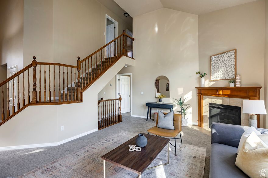 This charming two-story home offers space, flexibility, and the opportunity to make it your own. With 5 bedrooms and 2.5 bathrooms, the open floor plan features vaulted ceilings and comfortable living areas perfect for everyday life and entertaining. The main level includes a generous primary suite with a large tub and walk-in closet, plus an additional bedroom or office space. Upstairs you'll find three more bedrooms, and there's an unfinished basement ready for your vision. Nestled on a tree-lined lot with mature landscaping and just minutes from downtown Salt Lake City, the airport, and major highways-this home blends comfort with convenience.