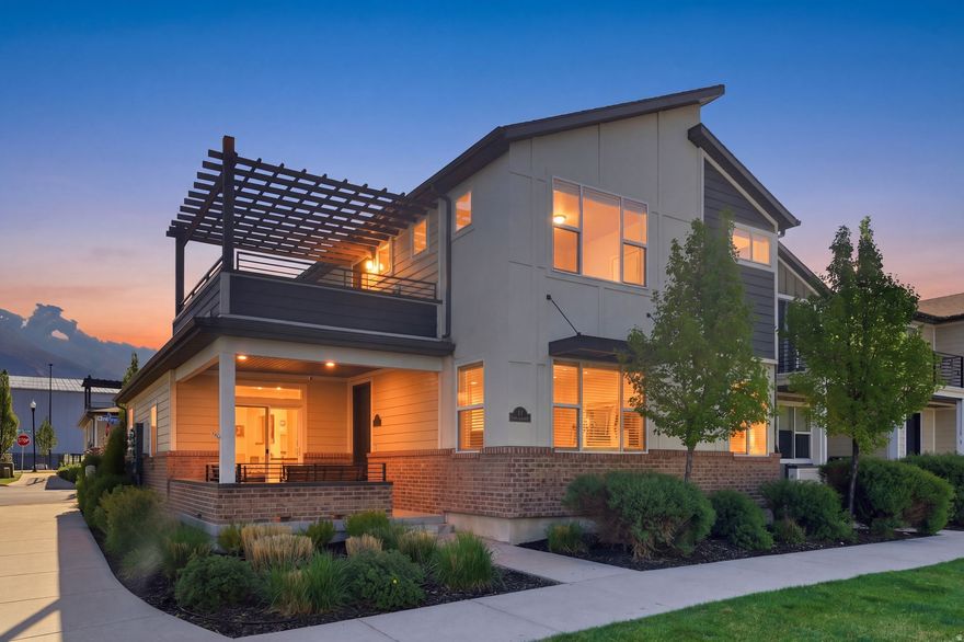 Corner-unit living with room to breathe - this two-story townhome at Farmington Station sits on a prime end position with extra privacy, two covered patios, and mountain views that make the upstairs deck a favorite spot to land at the end of the day. The layout flows generously, with a large primary suite, an open family room, and a dedicated den/office that works equally well for focused work-from-home days or a quiet retreat. Natural light wraps the space from multiple angles, and the corner setting means fewer shared walls and more of a single-family feel. Steps from the energy of Farmington Station - dining, shopping, the FrontRunner, and Station Park - this is low-maintenance living with a lifestyle that doesn't ask you to compromise.