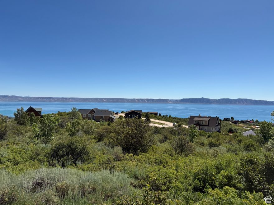 Situated at the top of Bear Lake West in Fish Haven, ID just over the Utah border.  Beautiful unobstructed views of Bear Lake with gradual slope which allows for a nice walk-out basement. Fully improved, ready to build your dream home! Roads are accessible year round.  Enjoy discounts on golf at the Bear Lake West Golf Course, swim in the pool , play pickleball or have fun at the lake!  All part of the HOA amenities.  No short term rentals in this HOA.  Start your Bear Lake adventure. Call today!
