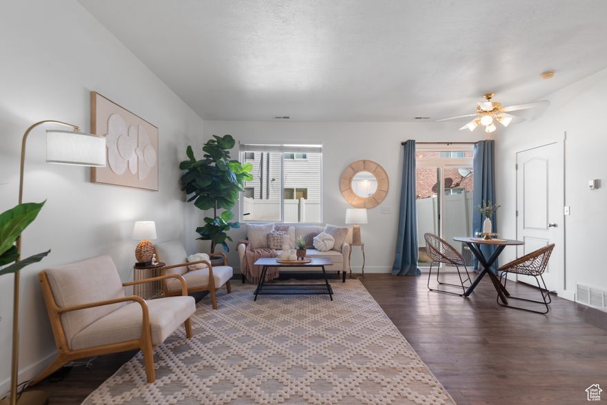 Don't miss this beautifully updated 3-bedroom, 2.5-bath townhouse that perfectly blends modern comfort with urban convenience. From the moment you walk in, you'll love the tall ceilings, open-concept layout, and natural light that fills the space. The home features fresh paint, sleek laminate flooring, and newer appliances, giving it a fresh, move-in-ready feel. You will also enjoy the perks of an attached garage and a fully fenced private yard perfect for pets, entertaining, or relaxing after a long day. Located on a quiet street, yet just a short walk to dozens of local shops, restaurants, and more, this home offers the best of both worlds. Whether you're commuting or just exploring, you'll love this central location. Urban vibes with a neighborhood feel This gem truly has it all! _Buyer to verify all including square feet.