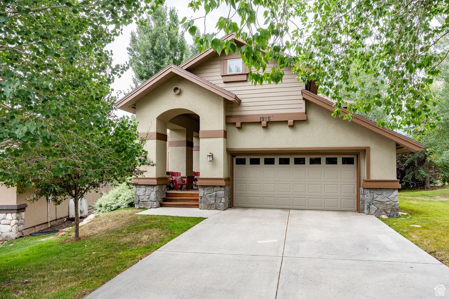 Discover the perfect blend of comfort, location, and mountain lifestyle in this 5-bedroom, 3.5-bath single-family home located in the desirable Willow Draw Cottage subdivision of Sun Peak. With breathtaking mountain views and quick access to Canyons Village at Park City Mountain Resort, this home offers both year-round adventure and peaceful retreat. Step inside to a warm and welcoming layout, where the open great room features vaulted ceilings and a two-sided fireplace that serves as a central focal point, elegantly separating the living area from the eat-in kitchen. The kitchen opens to a semi-formal dining area and offers direct access to a spacious deck-perfect for outdoor dining, entertaining, or simply soaking in the mountain views. Also on the main level, you'll find a versatile fifth bedroom-perfect as a home office or guest room. Upstairs, the primary suite is thoughtfully positioned to take full advantage of the mountain views, offering a private retreat. Two additional bedrooms and a shared full bath complete the upper level. The walkout basement is designed for entertaining, with a spacious family room and a wet bar-ideal for movie nights, game days, or relaxing after a day on the slopes. This level also includes a private bedroom, full bath, and laundry room. Step out to a covered patio, perfect for enjoying Park City's stunning four-season scenery. Residents of Sun Peak enjoy access to a clubhouse with pool, tennis and pickleball courts, and a well-equipped gym. Plus, the central location makes it easy to get to Kimball Junction, Main Street, and all of Park City's shopping, dining, and nightlife. This is a rare opportunity to own a home that offers both lifestyle and location in one of Park City's most coveted communities.