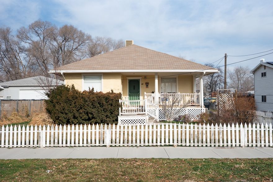 This charming, family owned home-held since the early 1900s-offers great potential in a quiet, welcoming neighborhood with a classic white picketstyle feel. The property offers potential for an accessory dwelling unit (ADU) with some updating and improvements, making it a strong opportunity for future rental income. Features include a brand-new furnace, four window coolers (all included), a sprinkler system, irrigation piping to the property, and water shares to be included. A small backyard shop with power adds extra flexibility for storage or projects. Located in a desirable, service-oriented community with easy access in and out, this property combines character, potential, and a warm neighborhood atmosphere.