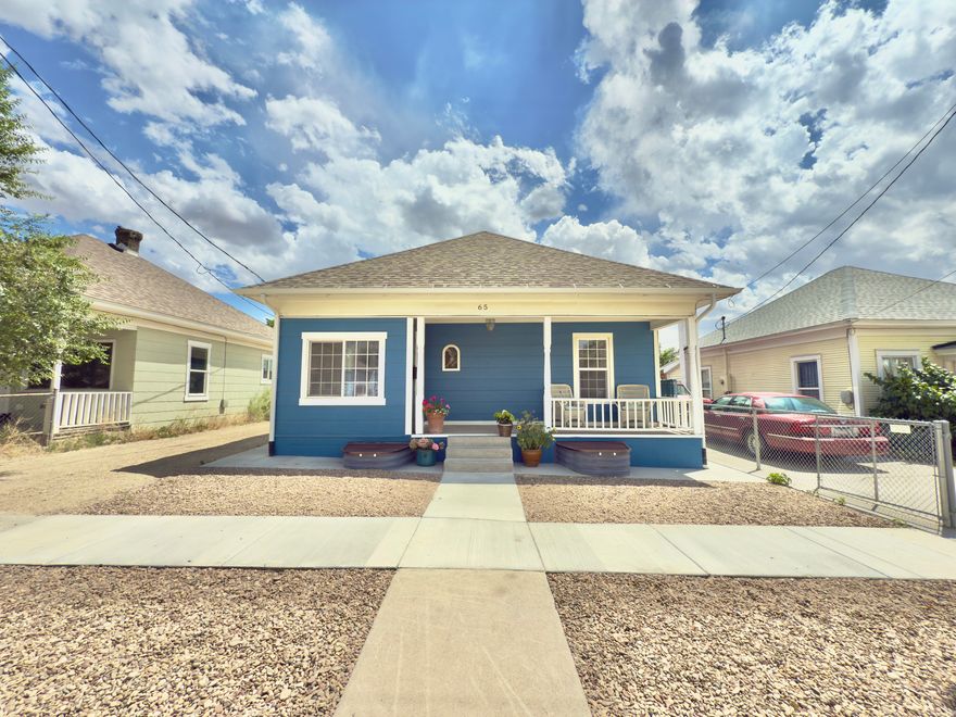 This beautifully updated bungalow features a welcoming front porch with picturesque views of Balance Rock. Located adjacent to the new Helper Express playground, which includes basketball and pickleball courts, this home offers countless recreational opportunities. With 4 bedrooms and 2 baths, it boasts two full kitchens and a basement with a separate entrance, making it ideal for a mother-in-law apartment or a spacious family home. Enjoy the convenience of being within walking distance to downtown Helper and the scenic river walk. A perfect blend of comfort and community awaits! Square footage figures are provided as a courtesy estimate only and were obtained from county records. Buyer is advised to obtain an independent measurement.