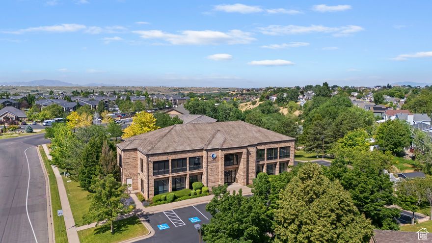 Exceptional opportunity to own a custom-built executive office building in the heart of South Ogden. Constructed in 1993 and thoughtfully updated throughout, this 15,558 square foot property features multiple office suites, a welcoming main lobby with elevator access, and a large delivery area complete with an overhead door-ideal for businesses requiring efficient logistics and access. Located in a high-traffic area with convenient freeway access, this building offers excellent visibility and accessibility. The property is beautifully landscaped and offers stunning mountain views, creating a professional and appealing environment for tenants and visitors alike. Additionally, well-established Calendar Systems Inc business operating on-site is available for purchase under a separate agreement-an excellent opportunity for an owner-user or investor. Whether you're expanding your portfolio or seeking a headquarters in a premier South Ogden location, this executive property delivers value, convenience, and long-term potential.