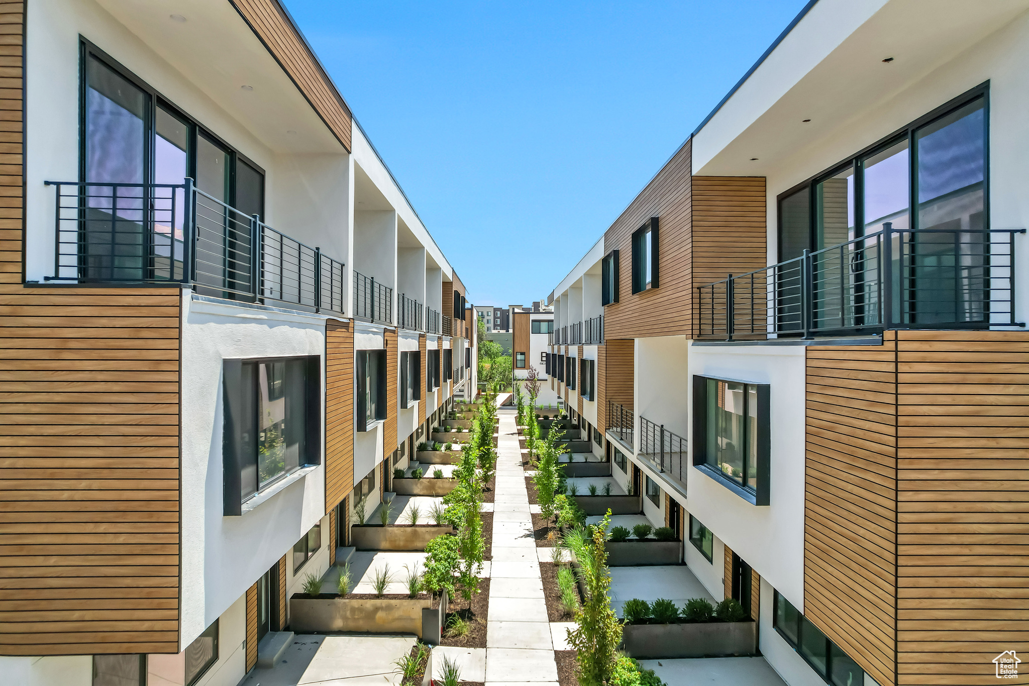 QUICK MOVE-IN SPECIAL! QUALIFIES FOR THE ZIONS BANK COMMUNITY INVESTMENT ACT LOAN! ONLY 3% DOWN! NO MORTGAGE INSURANCE! Welcome to Opus Green. Experience the perfect harmony of modern comfort and environmental stewardship. Opus Green Townhomes offer a range of floor plans, including 2- and 3-bedroom townhomes, designed with meticulous attention to detail. From the spacious great rooms and gourmet kitchens to the tiled bathrooms and open stair railings, every aspect of Opus Green exudes sophistication and elegance for your comfort. This modern townhome community is all-electric with 9'7" cathedral ceilings, tiled showers and tubs with glass doors. Best in class, Pella windows, ductless, wall-mounted mini split air conditioners and heat pumps, high-efficiency stainless steel appliance package. Quartz countertops and a one of a kind floorplan not seen before. This 3 bed 3.5 bathroom oasis will leave you green with envy. The 2 car garage with EV charging station, 1 touch smart home temperature control app and package storage/delivery service "Fetch Package", are just a few more added benefits to this zero emission environmental living townhome. Embrace a life of unparalleled comfort, elegance and fulfillment in the dwelling you've been longing for. Please navigate to our model at 4186 S Main Street, B #104, Millcreek UT 84107 for details and to gain access to unit O213.