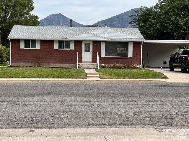 STUNNING NEW BATHROOMS. BEAUTIFULLY REFINISHED HARDWOOD FLOORS. Meticulously cared for home. Oversized yard with tons of space for potential for garden, more gathering space, sports court. ALL NEW FLOORING, New appliances. Freshly painted. COME SEE WHY YOU WANT THIS TO BE YOUR NEXT HOME. There is EASILY room for ONE MORE BEDROOM DOWNSTAIRS.