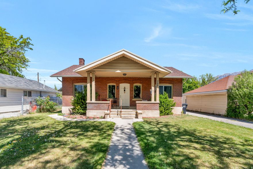Come live in this beautifully maintained and updated brick duplex in Provo, where you can live in one unit and rent the other from day one! At 2,534 sqft on a flat .34-acre lot, the home offers two fully independent units with separate gas and electric meters, water heaters, and AC, plus covered front and back porches. Recent updates include a new roof, a newly added bathroom, and updated kitchens with quartz countertops and gas ranges. The 3-bedroom unit features a large living and dining room, primary bath, and in-unit laundry, leased at $1,966/mo. The 1-bedroom owner's unit is move-in ready with an open kitchen, full bath, and laundry. The basement offers expansion potential into two more bedrooms for either unit, with mechanicals reachable without entering either living space. There is even a detached workshop with an RV-height carport, a shed, and off-street parking for eight. The huge sprinklered yard sits under mature trees, and fiber internet keeps both units connected. You will love this Provo address with BYU and UVU minutes away, plus quick access to Silicon Slopes, downtown Provo, and Provo Canyon for trails, Bridal Veil Falls, and Sundance! All information, figures, and documentation provided as a courtesy, buyer to verify all information.
