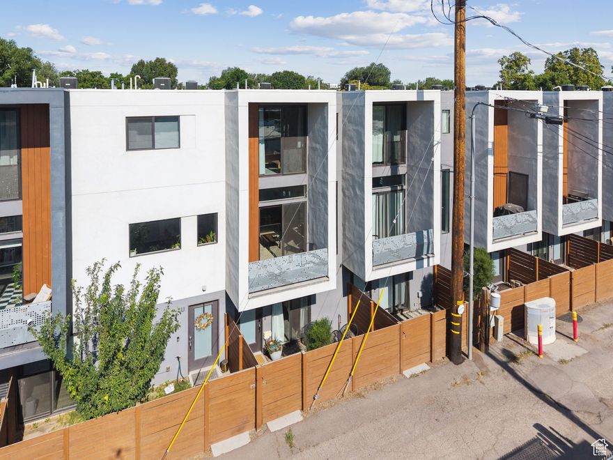 Enjoy modern living just off Main Street in downtown Salt Lake City, where convenience meets character. This prime location allows for easy access to a diverse array of restaurants, shops, and cultural attractions, all mere steps away from your front door. The gated two-car garage offers secure parking and added peace of mind in the bustling heart of the city. Inside, the residence features a warm and inviting atmosphere with thoughtfully placed windows that allow gentle streams of natural light to filter in, creating a cozy ambiance. The spacious layout is designed for both relaxation and entertaining, making it an ideal space for modern living. Whether you're looking to immerse yourself in the vibrant downtown lifestyle or seeking a peaceful retreat, this home offers the perfect blend of both. Don't miss the opportunity to make this beautiful downtown SLC property your own! Square footage is provided as a courtesy only. Buyer is advised to obtain an independent measurement and to verify all information.