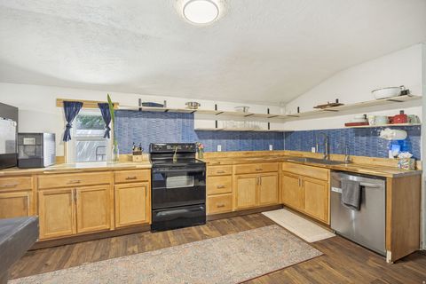 Tiny photo for 1445 W RUSSETT AVE, West Valley City, UT 84119 (MLS # 2156332)
