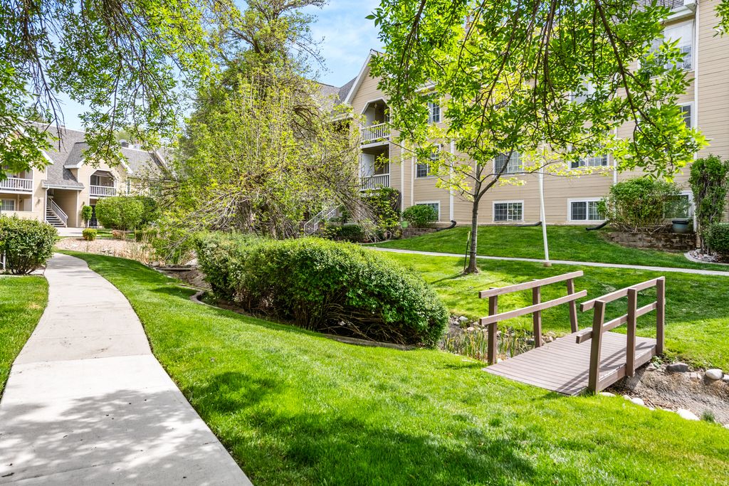 Photo of 1205 E WATERSIDE CV S #23, Midvale, UT 84047 (MLS # 2157948)