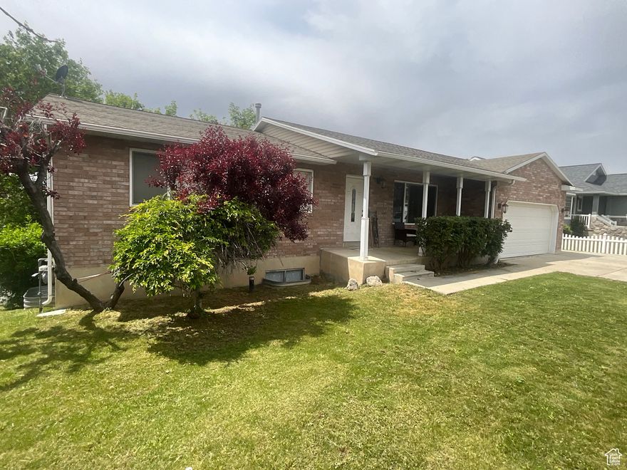 Sale felt through***OPEN TO SELLER FINANCING OFFERS ***Amazing opportunity!  Seller Financing is available with a minimum down payment of $100,000. rate  4.99% 5-year balloon.  Better rate with larger down payment ( contact agent for more info). -Subsidize your mortgage by renting the daylight (3 bedroom, 1 bathroom) basement with a separate entrance,  City allows a Short Term Rental, ADU (Accessory Dwelling Unit), or as a Mother-in-Law apartment (zoning allows basement apartment to qualify as an  ADU or short term rental).  Basement Apartment has a separate laundry room, tons of storage, daylight entrance, LVP flooring, newer carpet, and newer paint. The upstairs features beautiful hardwood floors, three bedrooms, two full bathrooms, a large laundry, and an amazing kitchen. Incredible Location! This Solid brick rambler with a daylight basement apartment is only 5 minutes from I-15 in Lehi and close to restaurants and shopping (Costco, Lowe's, Home Depot, Walmart, Target etc.). Great turn-key investment opportunity! The basement typically rents for $1,850/month.  Current lease can be transferred to a new owner or cancelled with 30 days' notice.  RV parking on the side.  The home is currently occupied and requires a 24-hour showing notice. Buyer and Buyer's agent to verify all information. Sq. Ft. provided as a courtesy.