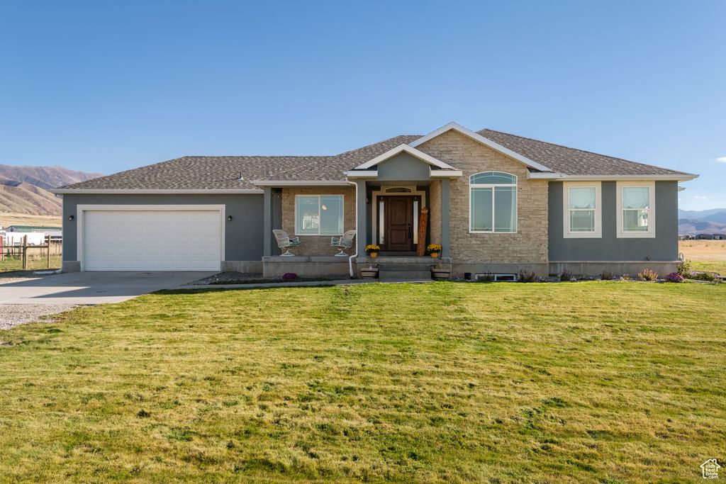 Photo of 1602 E ARROWHEAD LN, Erda, UT 84074 (MLS # 2119429)