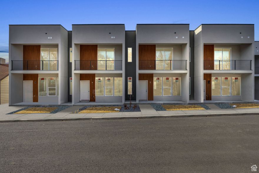 Model Home Hours TuesdayFriday: 12 PM4 PM These Four-story townhomes offer three en suite bedrooms, each featuring double vanity sinks, tiled surround showers, and spacious walk-in closets-one even boasts a private balcony. The home includes a generously sized kitchen with custom soft-close cabinets, stunning granite countertops, and a walk-in pantry. With two family rooms and a versatile flex room perfect for an office, there's plenty of space to suit your needs. Additional conveniences include a two-car garage pre-wired for an EV outlet and an attached storage room. Ideally situated just two miles from Weber State University and near Riverdale's shopping and dining options, these townhomes are HOA-approved for rentals, making them a fantastic investment opportunity.