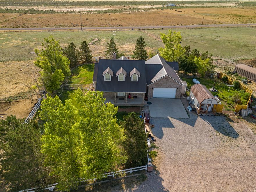 Rare opportunity on 8+ acres in Cedar City! This 5 bed, 4 bath, 3,428 sq ft home includes 2 water shares, a vegetable-producing garden, and space for sheep, a bull, horse, chickens, turkeys, and more. A large barn offers storage or livestock shelter. The property is fenced with an additional fully fenced yard behind the home. Perfect for homesteading or hobby farming with stunning views and room to grow-all just minutes from town!