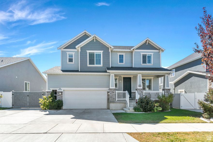 Stunning two-story home located in Vineyard's highly coveted Maples neighborhood. The kitchen features sleek white cabinetry, granite countertops, a gas cooktop, double ovens, and an oversized island with seating. The open-concept design flows seamlessly into the light-filled living area. The spacious primary suite offers abundant natural light and an ensuite bathroom with dual sinks, a walk-in shower, private toilet room, and a large walk-in closet. Upstairs you'll find an additional living area, while the fully finished basement expands the home with a family room, theater room, gym (sauna and heavy bag included), bedroom, and a spa-like bathroom featuring a separate tub and walk-in shower. Enjoy the backyard with its concrete patio, pergola, and green space-perfect for entertaining. Added perks include fully paid off solar panels and no HOA, a rare find in Vineyard. Conveniently located just 2 miles from the I-15 onramp, near great schools, and close to Vineyard Grove Park with splash pad, playgrounds, tennis courts, pavilions, sledding hill, and trails.This home truly has it all-comfort, convenience, and community. Measurements provided as a courtesy only, buyer to verify all info.