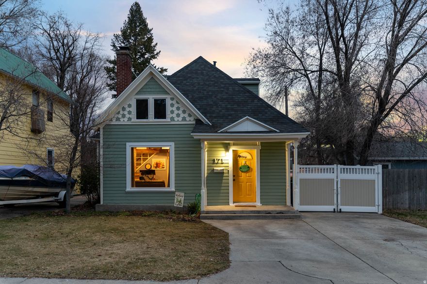 Step into the charm of 1898 with this character-filled home that beautifully blends historic detail with thoughtful updates for modern living. From the moment you walk in, you'll appreciate the warmth and unique touches that make this home truly special. The main floor offers comfortable single-level living with a spacious bedroom, full bath, updated kitchen, family room, and laundry. Upstairs, you'll find two additional bedrooms and a half bath, along with delightful nooks, angles, and ceiling lines that add personality and charm. Every room tells a story, with architectural details that simply can't be replicated in newer construction.