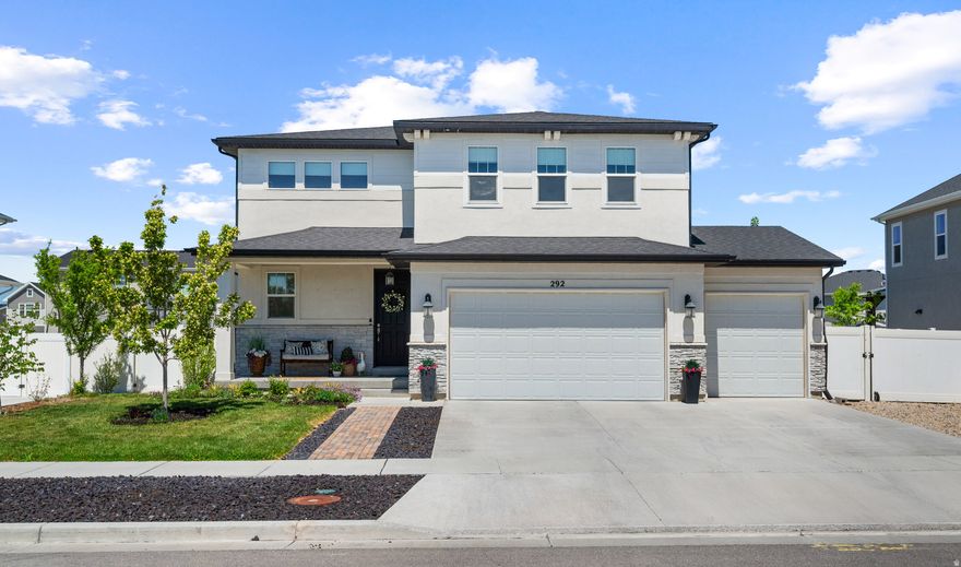 OPEN HOUSE SATURDAY 5-14-26 FROM 11:00am to 1:00PM. BE THE SECOND OWNER! Bright and open 4-bedroom home combines comfort and convenience in a serene, highly rated school district. Fully fenced backyard and situated just minutes from local parks and highway. This property also features engineered hardwood floors, surround sound, raised garden beds, fully covered back patio, and beautiful landscaping. Located just 25 minutes from the Salt Lake airport, nearby commerce, restaurants, parks, schools, grocery stores and more!  Square footage figures are provided as a courtesy estimate only and were obtained from county records. Buyer is advised to obtain an independent measurement.