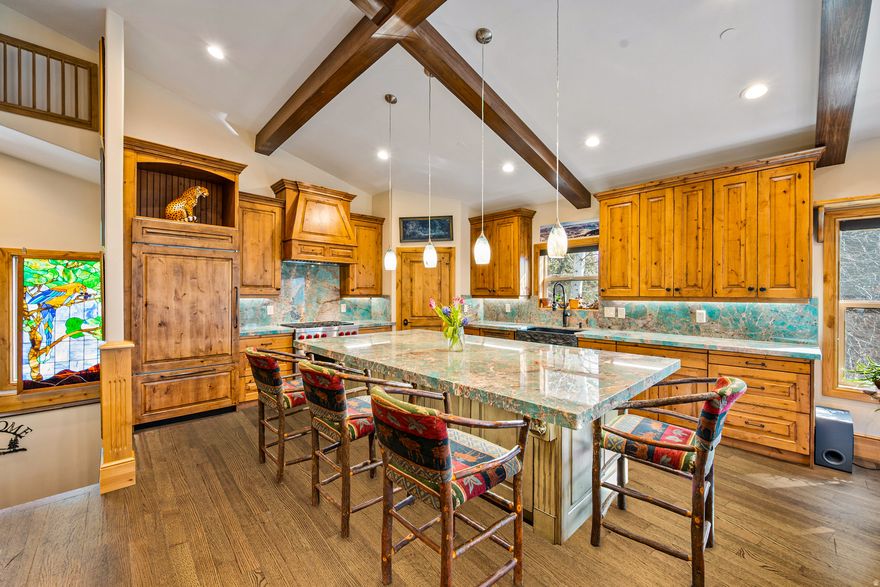 PRICE REDUCTION - $100K !   Stunning Views of Deer Valley, Jordanelle and Timpanogos in Tranquil Setting.  Welcome to your oasis of luxury in the heart of Deer Mountain, an exclusive community that offers breathtaking views of the Deer Valley Ski Resort & the Jordanelle. Wake up to views of snow-capped peaks & discover the ultimate retreat with this exquisite 4 BR / 3 BA home.  The open-plan living area is anchored by a wood-burning, stone fireplace and vaulted ceilings.  This beautiful home offers single level living with a kitchen, dining area, great room, primary bedroom with ensuite bathroom, secondary bedroom, bathroom, & laundry room on the main floor. The kitchen features Wolf & Sub-Zero appliances, solid white oak wood flooring throughout the home that seamlessly transitions into travertine bathrooms.  The lower, walkout level has a separate entrance, gas stone fireplace, wet bar, great room, 2 bedrooms, & a bathroom. Step into the backyard & discover your own private sanctuary: complete with a hot tub, stone patio & walkways perfect for entertaining & unwinding in nature.  As an added bonus, the 2 car garage has a Tesla charging station & lots of storage.  This home was remodeled in mid-2022 with a new roof, HVAC System, kitchen with quartzite countertops, deck, tankless water heater, central vacuum, flooring, fireplaces, electric shades on main level & many more upgrades too numerous to mention (see detailed improvement list).  Just minutes from world-class skiing at Deer Valley and PCMR, as well as historic Main Street dining & entertainment. The Jordanelle offers boating, paddle boarding, fishing, & waterfront fun, while hiking & biking trails connect you.   Don't miss this opportunity to own a piece of paradise located in the established & highly sought after Deer Mountain neighborhood (not surrounded by continuous construction) with low HOA & transfer fees.  See video of Deer Mountain Community and a Walkthrough Matterport Tour.    All information herein is deemed reliable but is not guaranteed. Buyer is responsible for verifying all listing information, including square feet/acreage, to the buyer's own satisfaction. See Exclusion List.