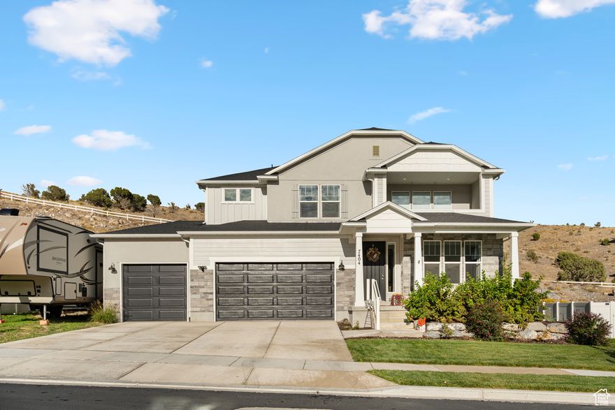 Beautiful, nearly new 2-story home in Eagle Mountain! This spacious home offers an open-concept floor plan with soaring ceilings and large windows that fill the home with natural light. The kitchen is designed for both cooking and gathering, with abundant cabinets and generous counter space. Upstairs, you'll find four bedrooms plus a main-level office/den, providing plenty of room for everyone. The unfinished basement offers room to grow and customize to your needs. Outside, the backyard has been leveled and is ready for your finishing touches, backing to city-owned land for added privacy and a peaceful, rural feel. RV parking along the side completes the package, making this home both functional and versatile. Don't miss the chance to make this one yours-schedule a showing today!