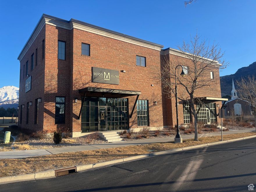 This is a flex commercial building with 2 commercial tenants and 4 2bed/2bath apartments above the commercial space.  Total footage of building is 9,000 sq feet. Each apartment rents for $1650 per month.  Commercial tenants are a salon and lighting company.  Both commercial tenants have paid for additional tenant improvements that are included in the sale.  All apartments include washer and dryer and refrigerators.  Total rents for the commercial tenants and apartment tenants is $16,005 per month. Buyer to verify all info.  Owner/Agent