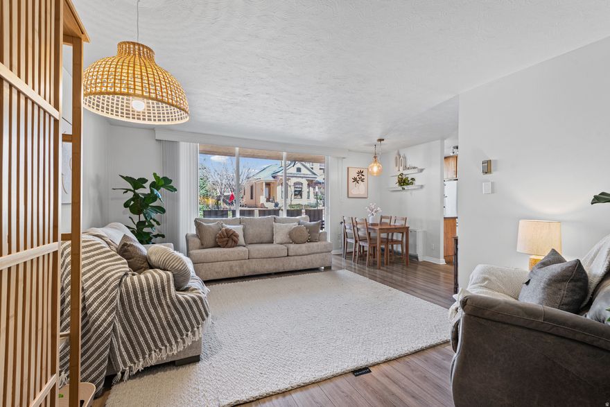 **OPEN HOUSE - Saturday 3/21 from 11-1pm** _ Downtown living at its best without the downtown price tag! This main-level corner condo is a rare find, featuring the only walkout deck in the entire community, perfect for relaxing, entertaining, or letting your pup out with ease. The community is incredibly dog-friendly. _ Inside, the home is flooded with natural light and showcases brand-new LVP flooring, new carpet and fresh paint throughout, giving it a clean, modern feel. With two assigned parking spaces inside the secure garage, two spacious bedrooms, and two bathrooms, the layout works perfectly for roommates, a small family, or anyone wanting a little extra space. _ Location is everything and this one delivers. Located in the Marmalade District you're close to Trax/Frontrunner, and just a 510 minute walk to the heart of downtown, where you'll find endless shopping, dining, and entertainment. Plus, you're only 2 blocks from the Capitol and the LDS Temple, with easy freeway access for commuting. _ Outdoor lovers will also appreciate the quick drive to nearby trailheads and 30 minutes in each direction to the world-class ski resorts of the Wasatch Mountains. _ Urban convenience, outdoor adventure, and a rare deck setup all in one incredible package! _Buyer to verify all including square feet.