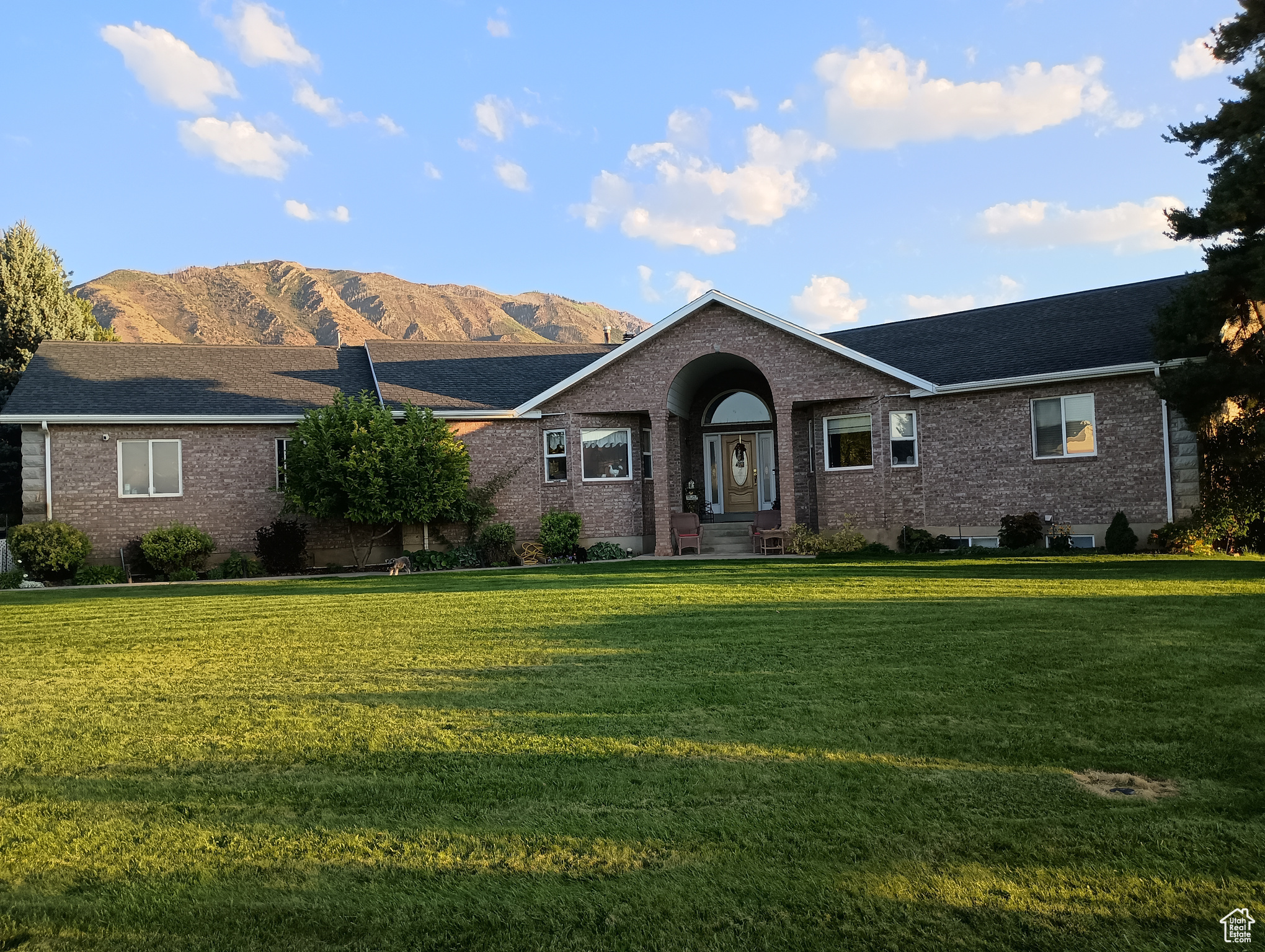 Incredible horse property. 5.25 acres with set sprinkler irrigation system. Includes 6.62 acres of Strawberry Highland Canal. Secluded yard with stream and mature landscaping. Large Pasture area with barn. Fully fenced pasture with electric wire. Home is one of a kind. Vaulted Ceilings with skylights. All bedrooms have baths. Stunning mountain views. Square footage figures are provided as a courtesy estimate only and were obtained from Utah County. Buyer is advised to obtain an independent measurement.