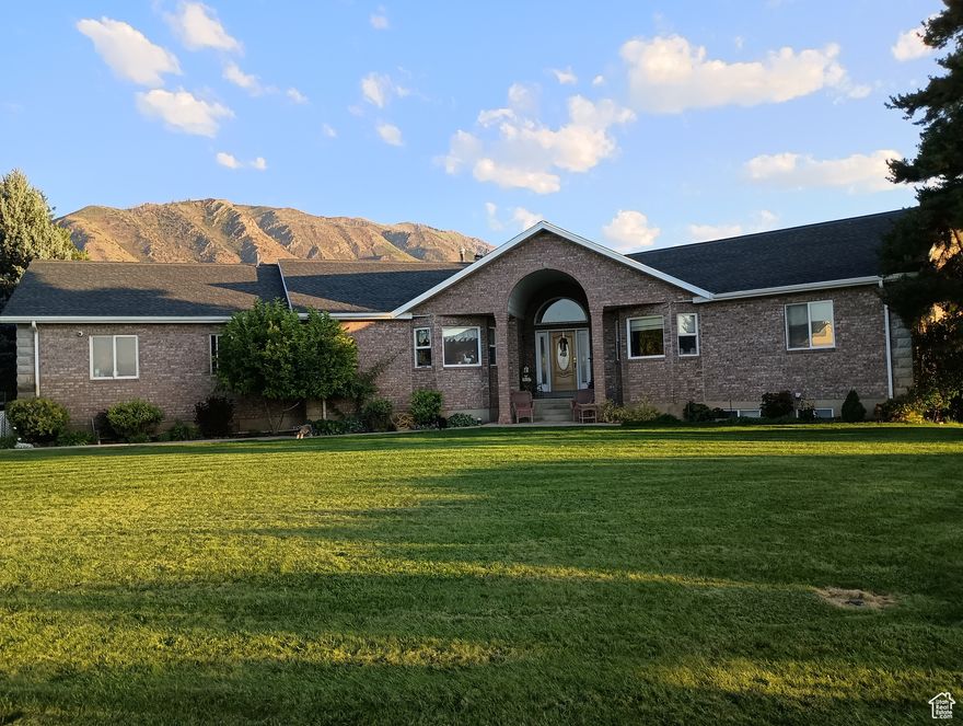 Incredible horse property.  5.25 acres with set sprinkler irrigation system. Includes 6.62 acres of Strawberry Highland Canal. Secluded yard with stream and mature landscaping.  Large Pasture area with barn. Fully fenced pasture with electric wire. Home is one of a kind. Vaulted Ceilings with skylights.  All bedrooms have baths.  Stunning mountain views.  Square footage figures are provided as a courtesy estimate only and were obtained from Utah County.  Buyer is advised to obtain an independent measurement.