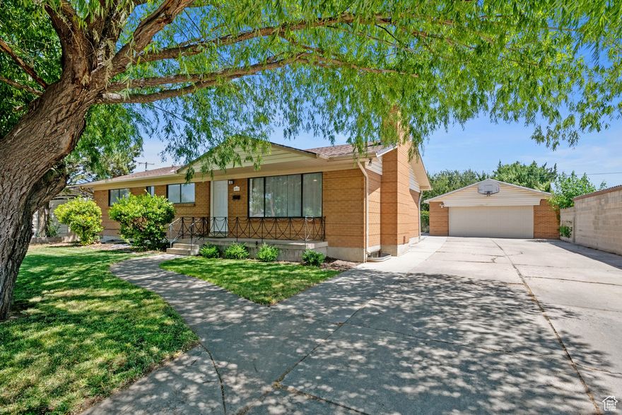 Welcome to your new home in the heart of the Salt Lake Valley! This spacious 6-bedroom, 3-bath Midvale residence offers nearly 2,900 square feet of comfortable living space, thoughtfully updated and full of natural light. With a separate 3-bedroom basement apartment-complete with its own entrance and laundry-this home is perfect for homeowners looking to offset their mortgage. The basement is currently rented TIL THE END OF SEPTEMBER OR YOU can resign their lease for $1,950/month, providing immediate income potential,You'll love the inviting charm of the green backyard, the convenience of a detached 2-car garage, and the extra space offered by the large driveway. Inside, the home features big windows that fill the space with sunlight, stainless steel appliances in the kitchen, and two full sets of washers and dryers-one for each level-making everyday living easy and efficient. Recent updates include a new roof (2020), furnace and A/C (2021), and water heater (2023), offering modern comfort and peace of mind. Ideally located just minutes from I-15, you'll enjoy quick access to downtown Salt Lake, the airport, and the tech hubs of Draper and Lehi. Whether you're an investor or someone seeking a home with built-in rental income, this centrally located gem is a rare find.