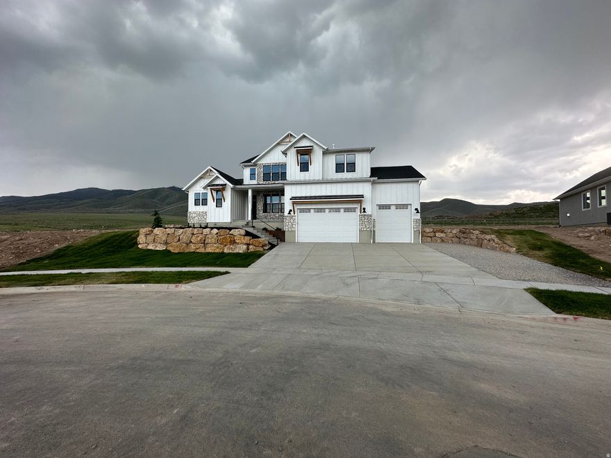 To-Be-Built Custom Home by Arrow Ridge Homes! Welcome to the Uinta-a thoughtfully designed 2-story home featuring 5 bedrooms, 3.5 bathrooms, and a spacious 3-car garage, situated on a .32-acre lot in a prime Salem location. This home offers an ideal balance of space, functionality, and modern design.  Conveniently located directly across the street from Salem Junior High, just 10 minutes to the Spanish Fork Main Street I-15 exit, and only 15 minutes from shopping, dining, and entertainment. Enjoy small-town living with quick access to everything Utah County has to offer.  Built by Arrow Ridge Homes, a trusted local builder known for flexibility and transparency. Buyers have the opportunity to customize finishes, adjust the floor plan, or work with the builder's in-house architect to tailor the home to their needs. Price reflects the proposed build-final price subject to selections and changes.  Don't miss the chance to build your dream home in a highly desirable Salem location!