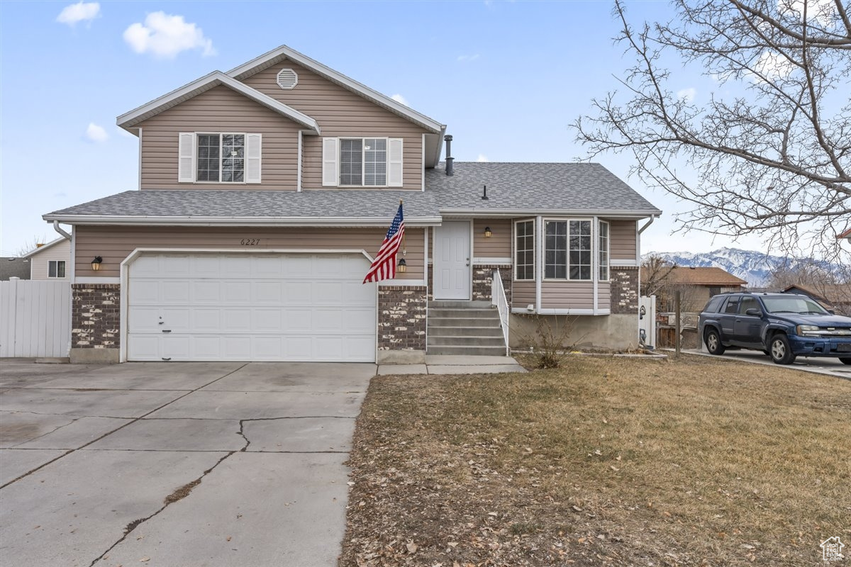 Don't miss this Beautiful Home in West Jordan at 6227 S 5070 W!  This spacious 5-bedroom, 2-bathroom residence offers modern updates, creating a fresh and inviting atmosphere. Enjoy a thoughtfully designed layout perfect for comfortable living, plus the convenience of a 2-car garage.  Located in a desirable West Jordan neighborhood, this home provides easy access to amenities, parks, and schools.  Schedule your showing today and experience all this fantastic property has to offer!