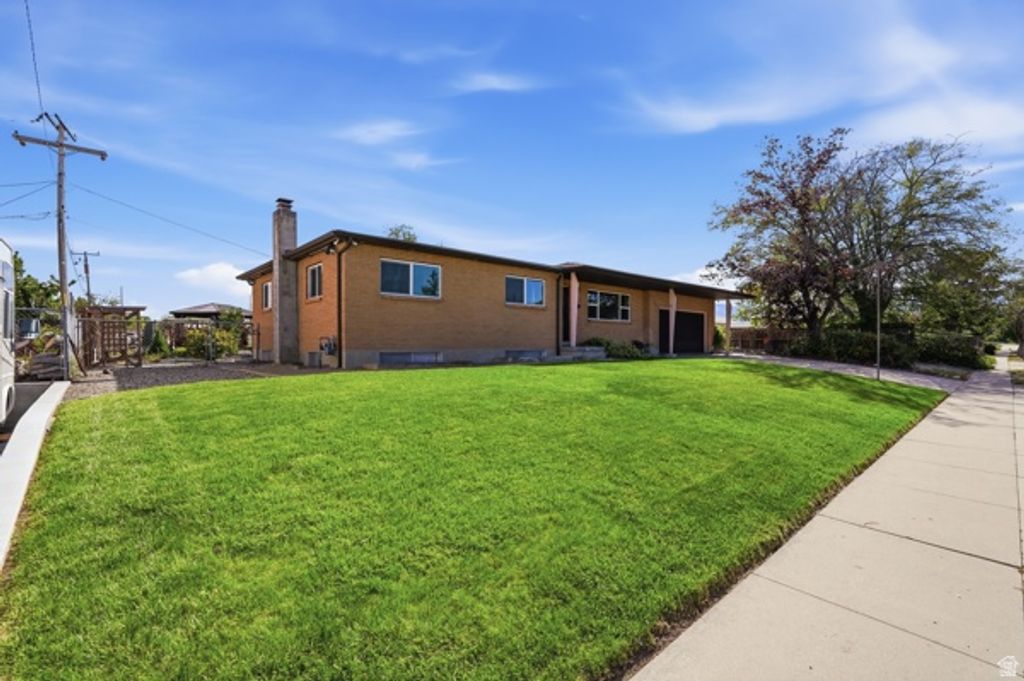 Photo of 5533 W JANETTE AVE, West Valley City, UT 84120 (MLS # 2153980)