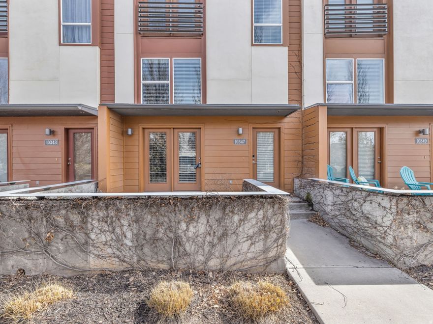 Step inside this impressive Daybreak townhome filled with high ceilings, abundant natural light, and a bright, welcoming atmosphere throughout. The open main living area features stylish two-tone paint, plush carpet, and French doors that lead out to the front patio - perfect for relaxing or entertaining.  The kitchen offers stainless steel appliances, tile flooring, recessed lighting, and a comfortable eat-in dining space, along with a convenient half bath on the main level.  Upstairs you'll find two spacious bedrooms, a full bath with an extended vanity, and a thoughtfully designed laundry area with built-in shelving.  Ideally located close to shopping, dining, parks, trails, schools, transportation, and all the amenities Daybreak is known for.