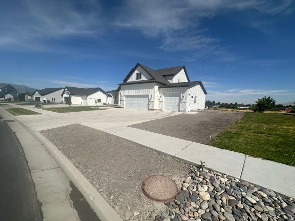 Photo of 505 W 3500 S, Nibley, UT 84321 (MLS # 2128136)
