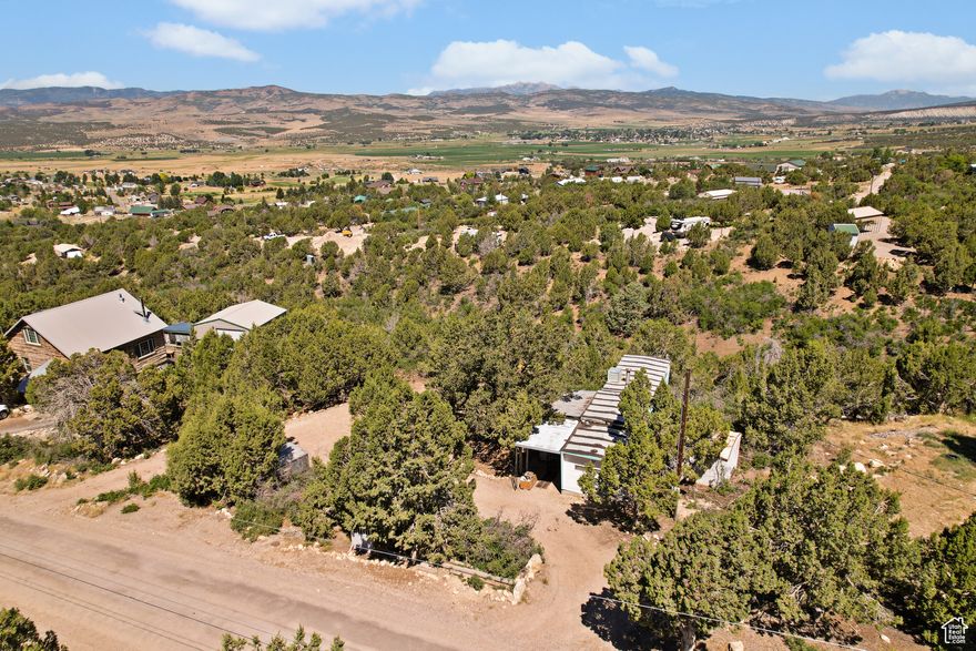 Seller says it's time...This lot is priced to sell! Year-round access lot in Skyline Mountain Resort with stunning views of Fairview Valley! This lot is ready for your dream cabin or home-or enjoy it as-is with the vintage trailer already on site. Just far enough to feel like a true getaway, yet close enough for easy access when needed. Enjoy all the community amenities including a pool, clubhouse, rental cabins, RV park, golf course, and endless outdoor recreation. A perfect mountain escape!