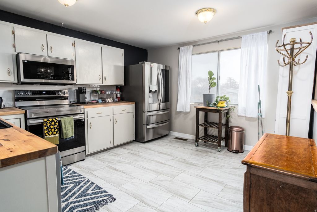 Photo of 6553 W 3880 S, West Valley City, UT 84128 (MLS # 2129775)