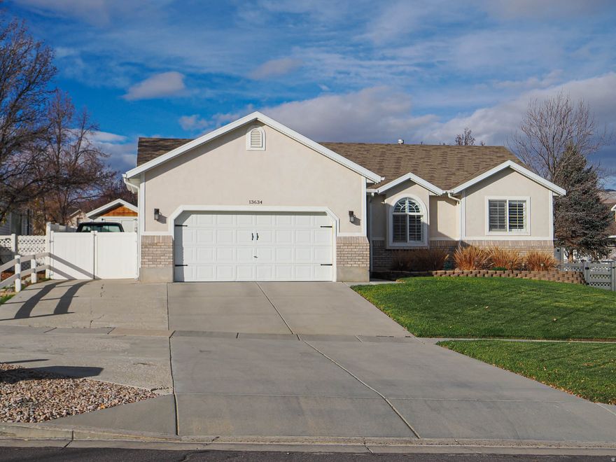 Back to the market, nice opportunity for this fantastic Herriman home! Pride of Ownership inside and outside! *No HOA* Plantation Shutters, Granite countertops, a bright kitchen open to the family room, vaulted ceilings, 5 bedrooms, 3 full bathrooms, and 2 family rooms. Awesome Yard! Oversized covered patio with stamped concrete, RV parking, a shed, a fire pit, garden boxes, a private yard, swing set, fully fenced, auto sprinklers, a permanent holiday lighting system, walking path behind, and close to a playground-great location on a quiet street. Square footage figures are provided as a courtesy estimate only and were obtained from the county records. Buyer is advised to obtain an independent measurement.