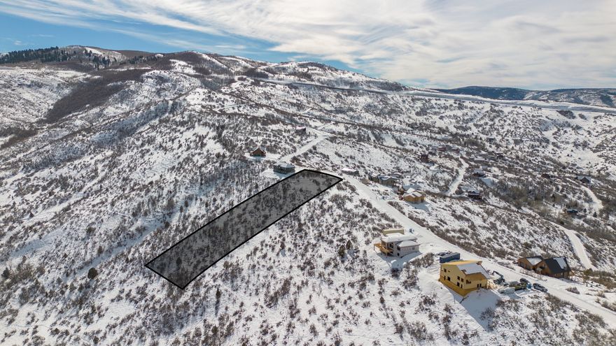 TOP OF THE WORLD. WHAT A WONDERFUL PLACE TO BUILD A CABIN/HOME ON THIS RIDGETOP 1.2 AC LOT IN A GATED MOUNTAIN COMMUNITY WITH PLOWED ROADS. BOASTING INCREDIBLE MOUNTAIN AND VALLEY VIEWS. SITUATED NEAR THE RENOWNED PARK CITY SKI RESORTS AND LOCAL BEAUTIFUL GOLF COURSES. THIS LOACTION OFFERS UNPARALLED ACCESS TO OUTDOOR ADVENTURES INCLUDING HIKING, FISHING, OHV TRAILS AND SNOWMOBILING ROUTES INTO THE ADJACENT NATIONAL FOREST. YOU WILL BE PINCHING YOURSELF WHILE RELAXING IN THE HOME YOU BUILD AMIDST NATURE'S FINEST BACKDROP, WHERE EVEREYDAY BRINGS NEW OPPORTUNITIES FOR EXPLORATION AND RELAXATION. PERC TEST (2021) & SLOPE ANALYSIS (2007, Needs Updating). Shadowed Pictures are for reference only. Buyer to verify all info and lot boundaries to their satisfaction.