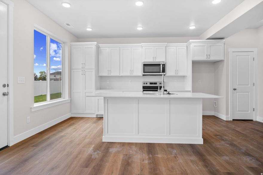 Ask about the BUILDER NEW YEAR PACKAGES! The size of a Single Home at a Townhouse Price! MOVE IN READYThe size of a Single Home at a Townhouse Price! 3 Bedrooms, 2.5 Bathrooms, 2 Car Garage and room to grow in the Unfinished Basement! Prime location is close to everything. The Main Floor invites the crowds with an Open Kitchen-Dining-Living Room Concept with 9ft Ceilings and a convenient Half Bathroom. A Mud Room awaits you from the Garage. All the Bedrooms and Laundry are upstairs. The Master Bathroom has Separate Tub and Shower and an amazing Walk-in Closet. You could finish a full Bathroom (it is roughed in), and either a Family Room and a Bedroom or 2 Bedrooms. The Builder's quality is throughout with Custom Cabinetry, Granite Counters, Cased Windows, Tray Ceilings in Master Bedroom and more! ONLY 4 UNITS LEFT **Some pictures are of a similar completed unit. Color selection is similar but not identical.**