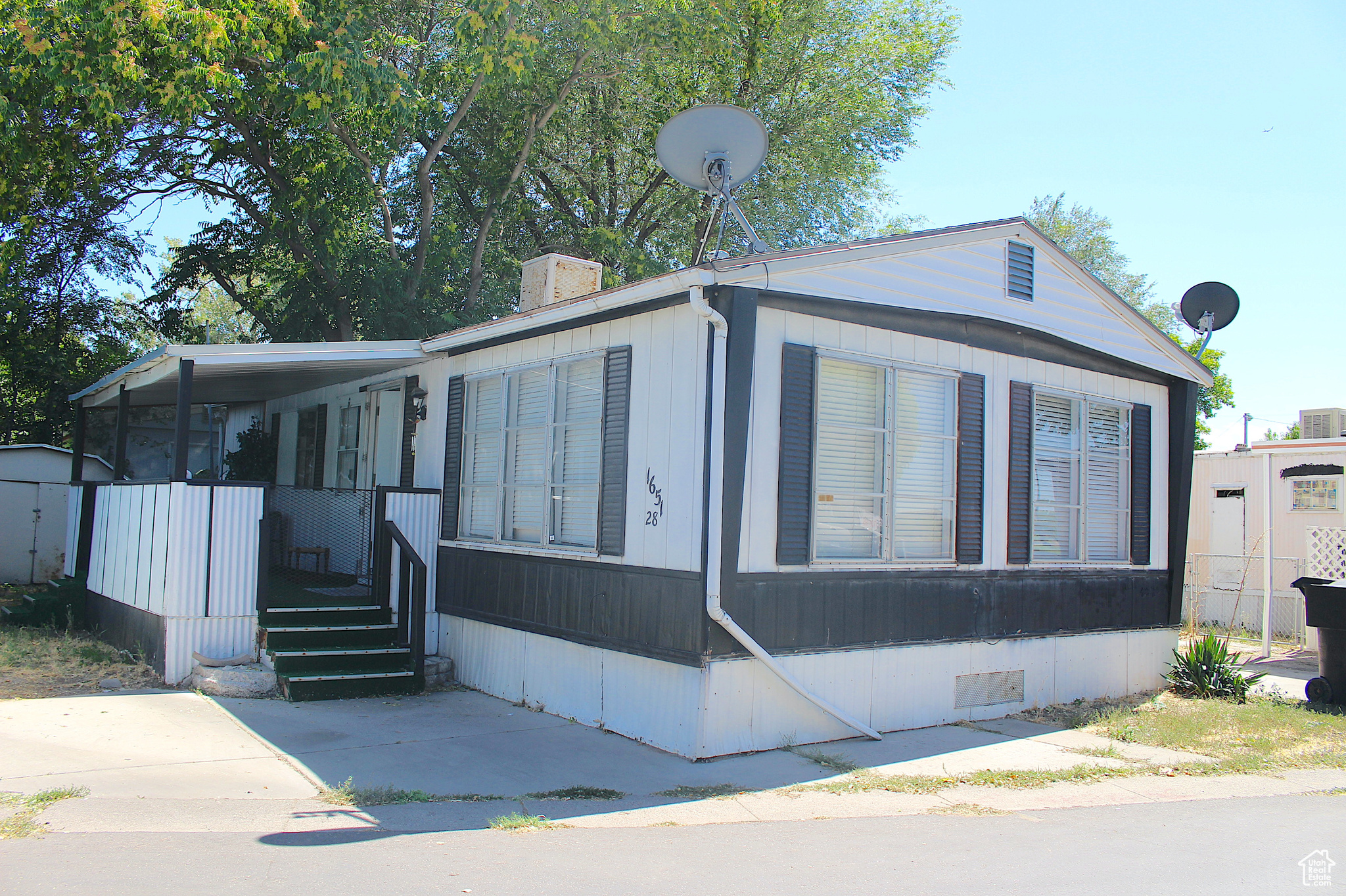 "**Price reduced motivated seller! Bring all offers."**Affordable living in a central West Valley City location! This well kept 2- bedrooms, 1-bath manufactured home is nestled in a quiet and established community just minutes from school, parks, shopping and freeway access. Enjoy a spacious interior with updated flooring and bright open layout. Park approval required. Cash buyers preferred. Schedule your showing today! All information provided as a courtesy- Buyer to verify all.