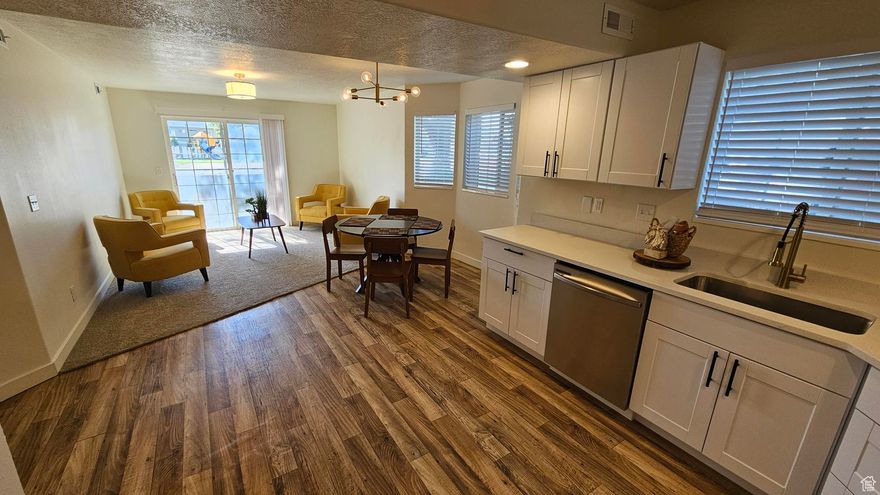 Completely Remodeled Home Across from UVU!  This beautifully updated home has been completely remodeled and is move-in ready! The modern kitchen features white cabinets and quartz countertops, creating a fresh and timeless look. Throughout the home, you'll find new paint, flooring, light fixtures, and vanities, giving every space a bright, inviting feel.  The layout is very homey, perfect for comfortable living and entertaining. Located just across from the UVU campus and close to shopping, restaurants, and freeway access, this home is in an unbeatable location.  Don't miss this opportunity to own a stylish, low-maintenance home in the heart of Orem!