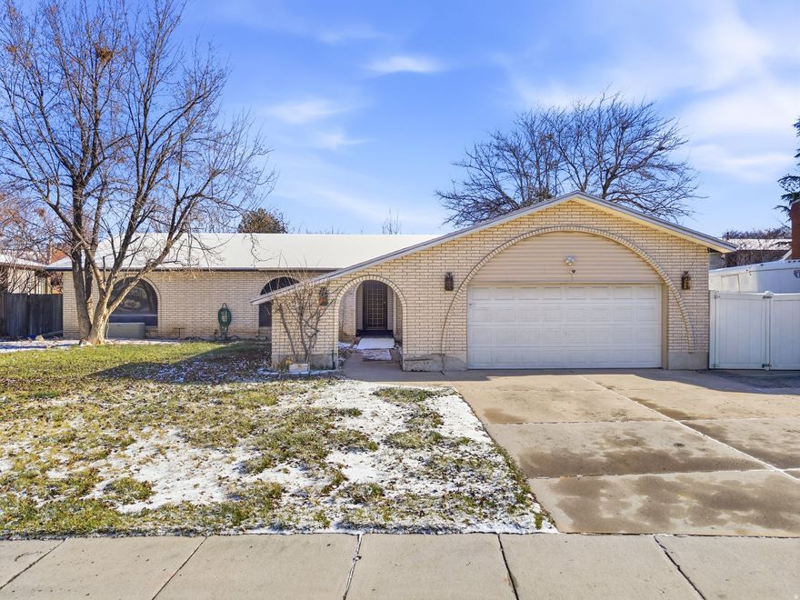 Investor special in a prime Murray neighborhood. Solid brick exterior with arched windows and an arched entry gives this home great character. Roof is in good condition. Two-car garage with extra parking, fully fenced backyard, and mature landscaping. Mostly one-level living with minimal stairs, three spacious bedrooms, one full bath, one three-quarter bath, and a half bath. Incredible location with quick freeway access and just minutes to the hospital, Shopping and dining. Interior needs work. Photos coming soon.