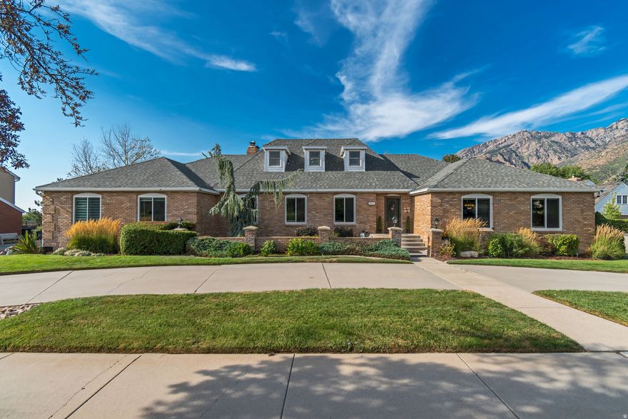 Experience luxury, comfort, and endless possibilities in this remarkable home, perfectly situated on a half-acre lot. The home boasts two garages, a Trex deck that spans the entire width of the house, and a stunning backyard ideal for entertaining or relaxing in your own private retreat. Inside, radiant heating with copper piping ensures year-round comfort, while new windows provide efficiency and natural light throughout. An elevator connects the garage, main floor, and walk-out basement for ultimate convenience. The walk-out basement includes a brand new kitchen and two separate entrances, making it perfectly suited for a mother-in-law apartment, multigenerational living, or guest suite. Additional basement highlights include extensive storage with built-in shelving, a root cellar, and unfinished square footage offering incredible potential for future living space, a home theater, gym, or studio ready for your vision and future expansion. This home is a rare blend of craftsmanship, functionality, and potential, offering exceptional living now with room to grow in the years ahead.