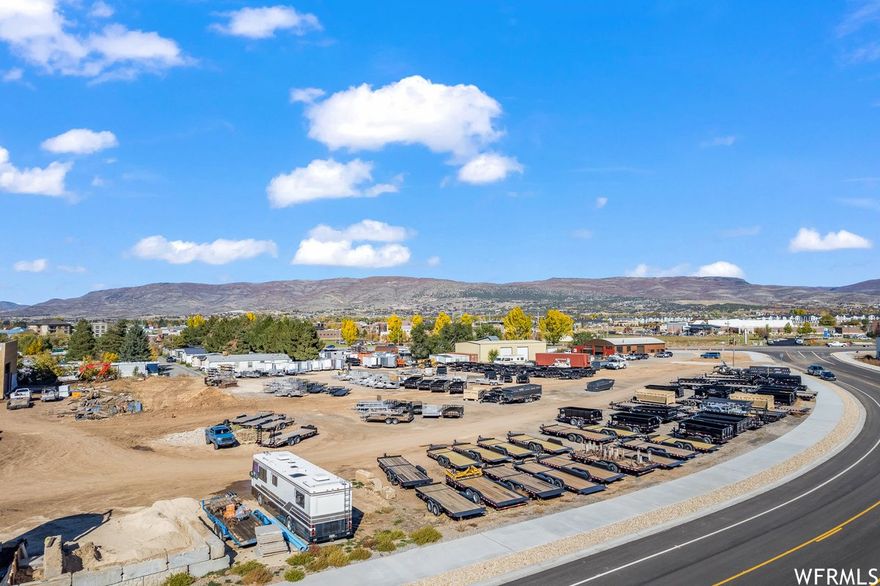 PRIME COMMERCIAL PROPERTY IN THE BEAUTIFUL HEBER VALLEY!! 2.731 ACRES ZONED C-2 IN A INCREASING DEVELOPED AREA OF THE VALLEY.  JUST OFF HWY 40 THIS COMMERCIAL LOT HAS GREAT VISIBILITY AND MANY DEVELOPMENT OPTIONS. Lot can be divided into small parcel sizes for other commercial options.  ALL UTILITIES TO THE LOT!!  VACANT LOT. Buyer to verify all information.  Acreage figures are provided as a courtesy estimate only.  Buyer is advised to obtain an independent measurement.