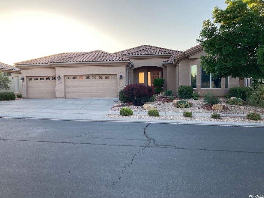 Beautiful home is ready for you with light, bright and open floor plan.  East facing backyard is fenced and gated.  Two Master Bedrooms.   Gorgeous granite counters, newer fireplace, upgraded appliances. Great room opens to the extra large covered patio.