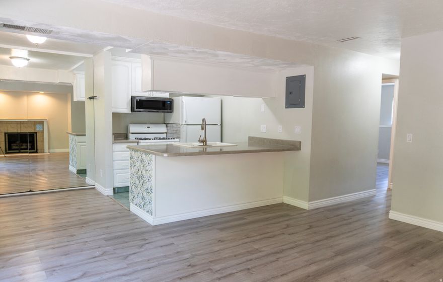 2 Bed condo in a great location in the heart of Murray. Minutes from Murray Park, the freeway, shopping, and more. Cozy condo with a patio that opens out to a stream. Approved for FHA and Utah Housing and the Seller will consider Seller Financing. HOA features a pool and clubhouse. Buyer to verify all info.