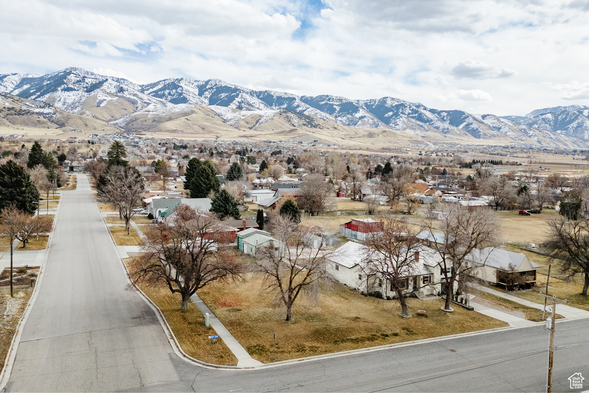 You'll love this rare Smithfield Corner Lot with mature trees, views of the mountains and an excellent location. Plus, secondary water for irrigation is included. Drive-by today or call to set up a showing! Lot will not be sold before adjacent home so homebuyer has first right to this vacant lot.